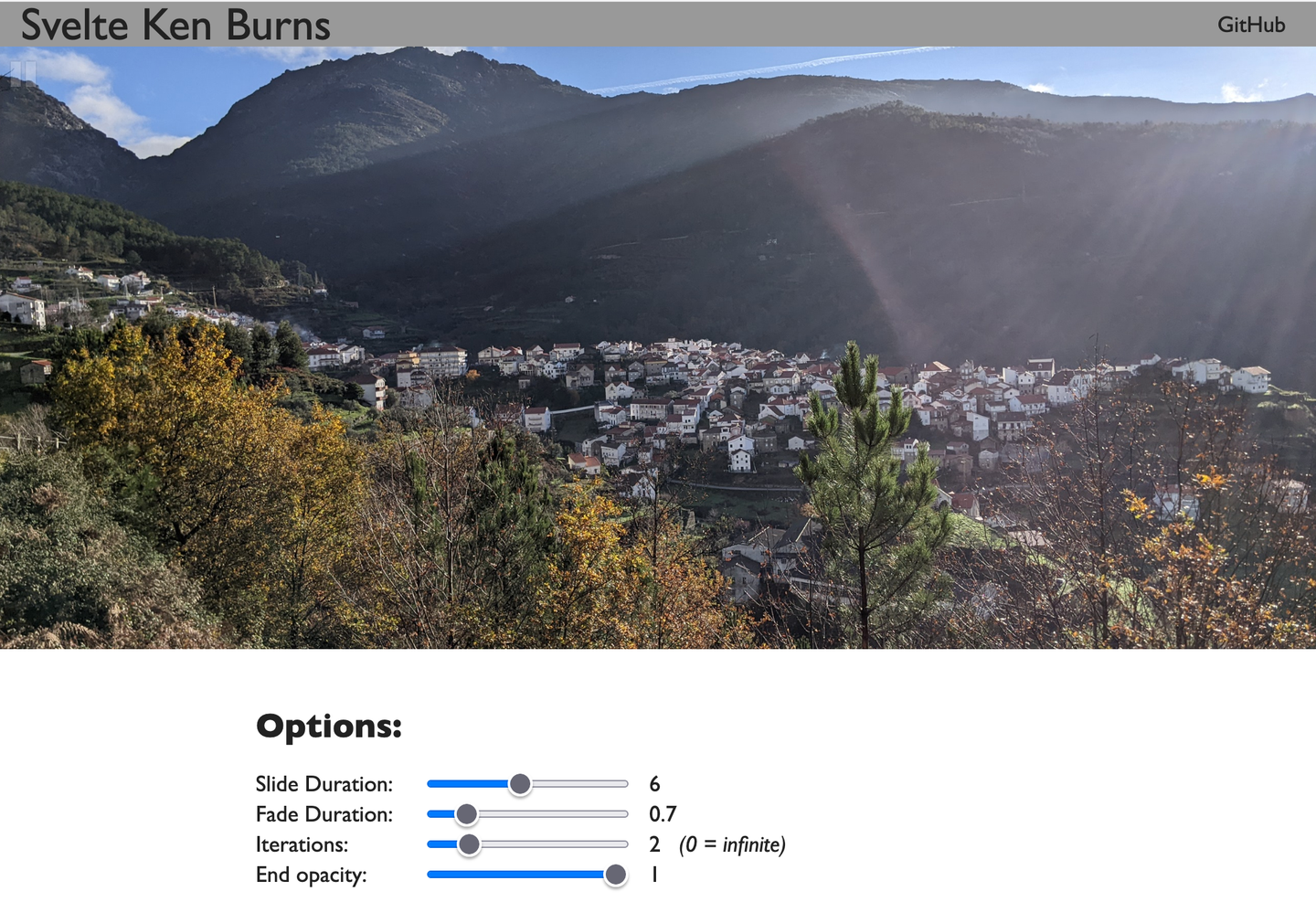 demo site screenshot of the slideshow interface with mountain village photo and sliders for adjusting animation settings